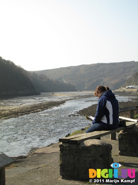 SX17726 Jenni reading at Solva Harbour